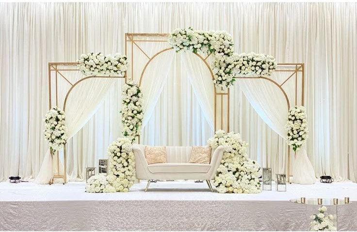 Elegant outdoor wedding reception with beautiful floral centerpieces